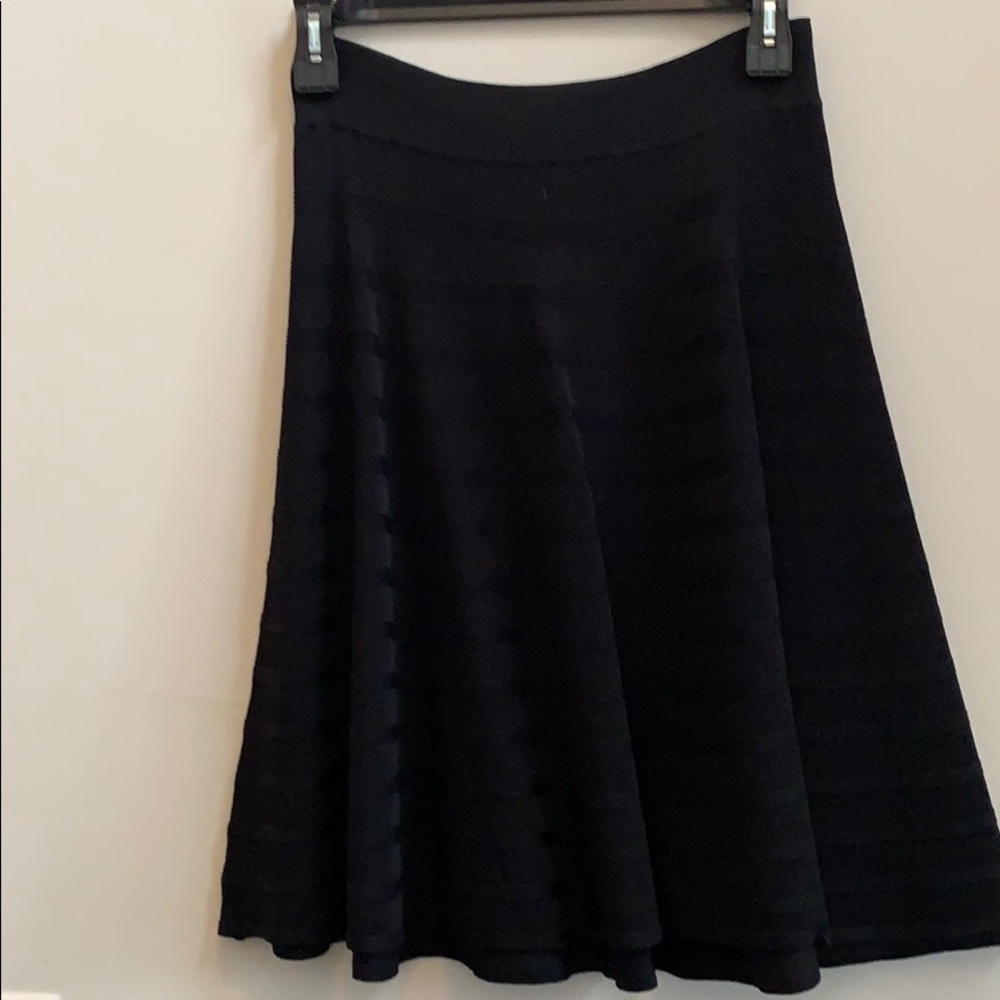 Flared black knit skirt